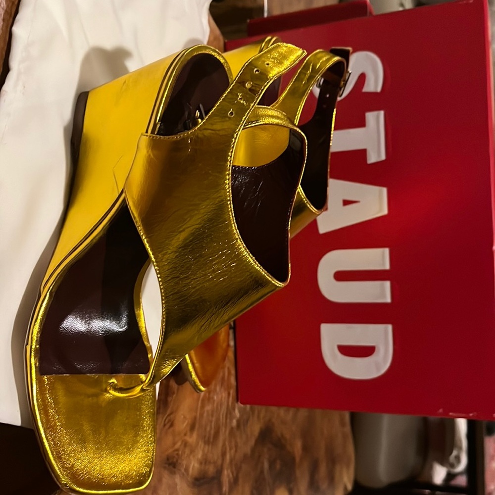 Brand new in box Staud Gold Alex Wedge. Box and dust bag included. Size 8 US.
